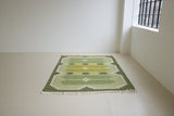 Alf is a vintage rug handwoven in Sweden for Svensk He Mslöjd which is a 1899 founded non-profit association that focused on Swedish textiles. This beautiful flatweave features a stunning green colour palette and an elegant geometric design.
