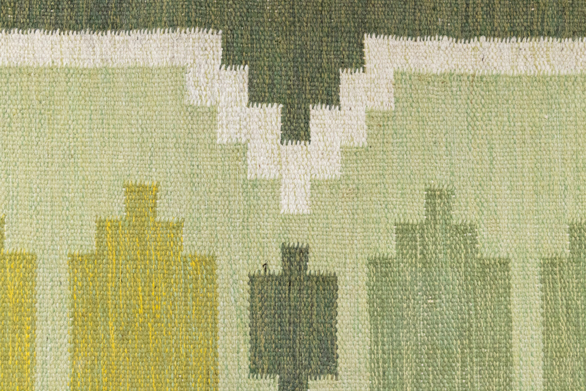 Alf is a vintage rug handwoven in Sweden for Svensk He Mslöjd which is a 1899 founded non-profit association that focused on Swedish textiles. This beautiful flatweave features a stunning green colour palette and an elegant geometric design.