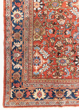 This a Vintage Persian Rug from Mahal in Persia. This hand woven Carpet features a lovely red ground with an all over design.