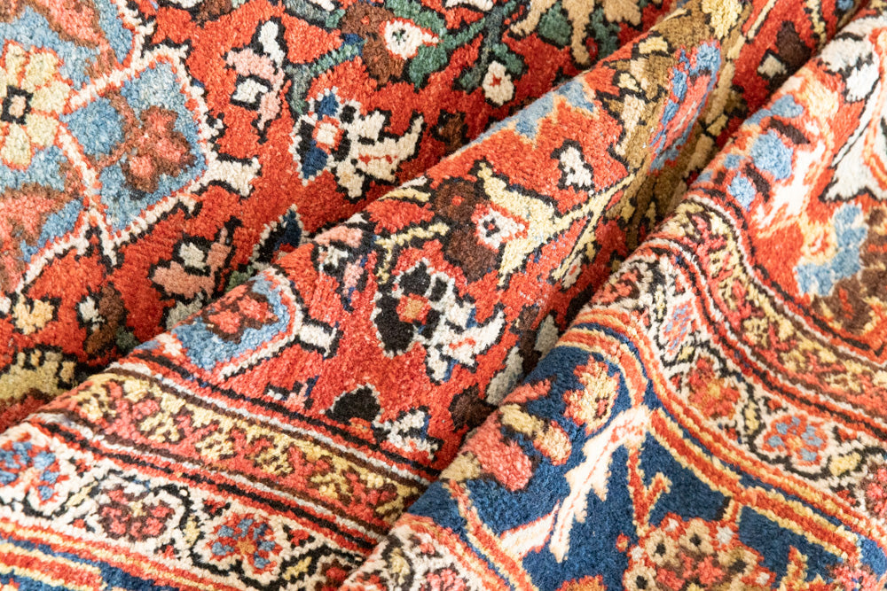  This a Vintage Persian Rug from Mahal in Persia. This hand woven Carpet features a lovely red ground with an all over design