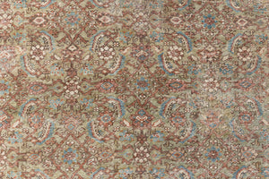 Mahal rugs are some of the most desirable Persian village rugs. This Carpet features an extremely rare pistachio green field and a highly unique floral Herati design 