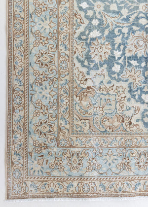 This is a vintage Persian Keshan rug that has been over-dyed to gently fade its original colours, giving a more neutral palette. Persia has the most desirable rugs and carpets with stunning designs such as this carpet. Now available at Ourika London.