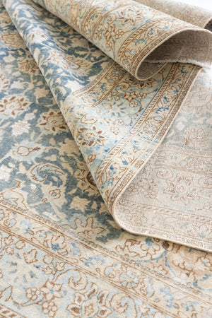 This is a vintage Persian Keshan rug that has been over-dyed to gently fade its original colours, giving a more neutral palette. Persia has the most desirable rugs and carpets with stunning designs such as this carpet. Now available at Ourika London.
