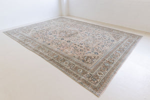 This is a handmade vintage Tabriz rug woven in Persia. The Tabriz region is known for producing some of the most ornate Persian carpet, often known for their mesmerising and intricate repeating patterns.