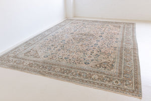 This is a handmade vintage Tabriz rug woven in Persia. The Tabriz region is known for producing some of the most ornate Persian carpet, often known for their mesmerising and intricate repeating patterns.