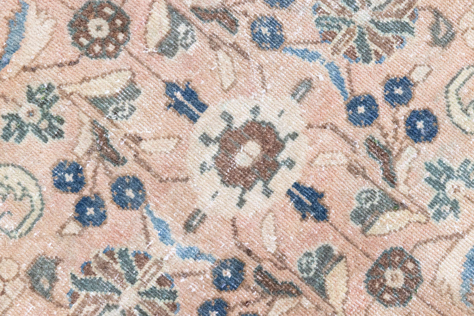 This is a handmade vintage Tabriz rug woven in Persia. The Tabriz region is known for producing some of the most ornate Persian carpet, often known for their mesmerising and intricate repeating patterns.