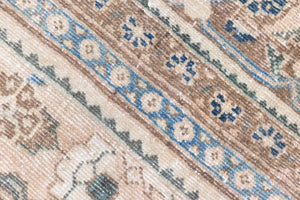 This is a handmade vintage Tabriz rug woven in Persia. The Tabriz region is known for producing some of the most ornate Persian carpet, often known for their mesmerising and intricate repeating patterns.