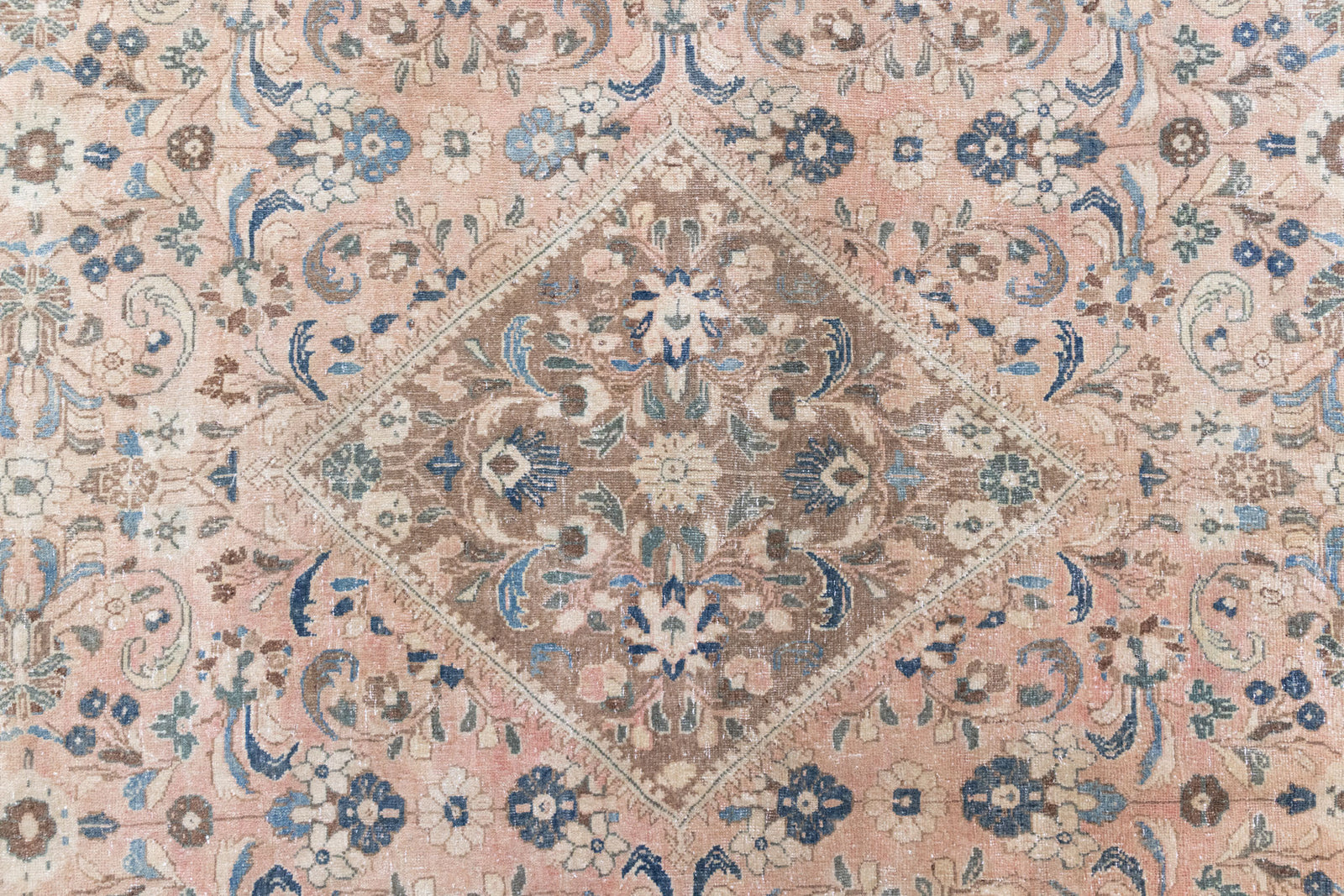 This is a handmade vintage Tabriz rug woven in Persia. The Tabriz region is known for producing some of the most ornate Persian carpet, often known for their mesmerising and intricate repeating patterns.