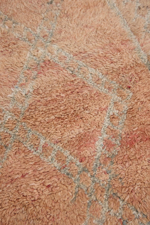 Aliya Beni M’guild vintage thick pile carpet. Peach coloured with a grey geometric pattern.