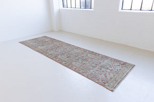 Sage is a Persian Malayer runner with a beautiful palette of blues and terracotta and a wonderful patina. The Malayer region is known for producing some of the most ornate Persian rugs, often known for their mesmerising and intricate repeating patterns.