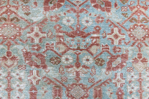 Sage is a Persian Malayer runner with a beautiful palette of blues and terracotta and a wonderful patina. The Malayer region is known for producing some of the most ornate Persian rugs, often known for their mesmerising and intricate repeating patterns.