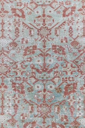 Sage is a Persian Malayer runner with a beautiful palette of blues and terracotta and a wonderful patina. The Malayer region is known for producing some of the most ornate Persian rugs, often known for their mesmerising and intricate repeating patterns.