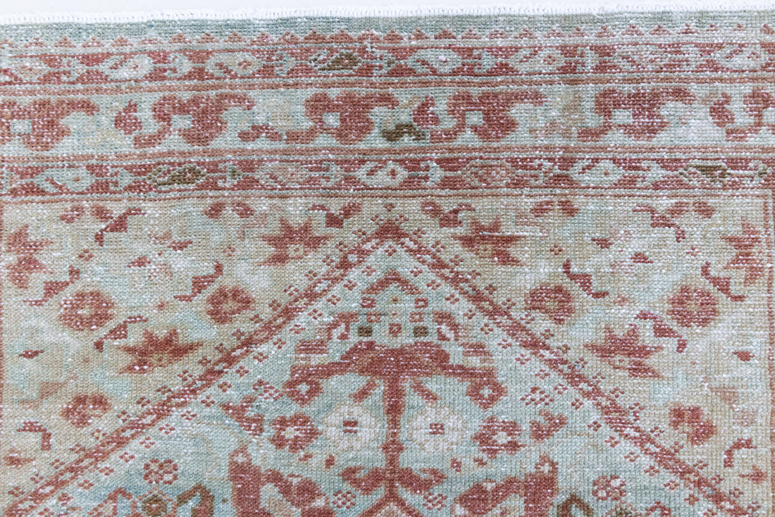 Sage is a Persian Malayer runner with a beautiful palette of blues and terracotta and a wonderful patina. The Malayer region is known for producing some of the most ornate Persian rugs, often known for their mesmerising and intricate repeating patterns.