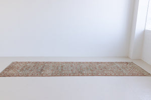 Sage is a Persian Malayer runner with a beautiful palette of blues and terracotta and a wonderful patina. The Malayer region is known for producing some of the most ornate Persian rugs, often known for their mesmerising and intricate repeating patterns.