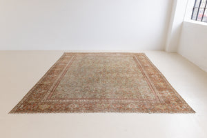 Mahal rugs are some of the most desirable Persian village rugs. This Carpet features an extremely rare pistachio green field and a highly unique floral Herati design 