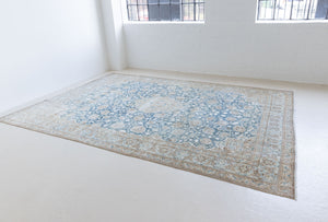 This is a vintage Persian Keshan rug that has been over-dyed to gently fade its original colours, giving a more neutral palette. Persia has the most desirable rugs and carpets with stunning designs such as this carpet. Now available at Ourika London.