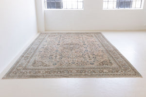 This is a handmade vintage Tabriz rug woven in Persia. The Tabriz region is known for producing some of the most ornate Persian carpet, often known for their mesmerising and intricate repeating patterns.