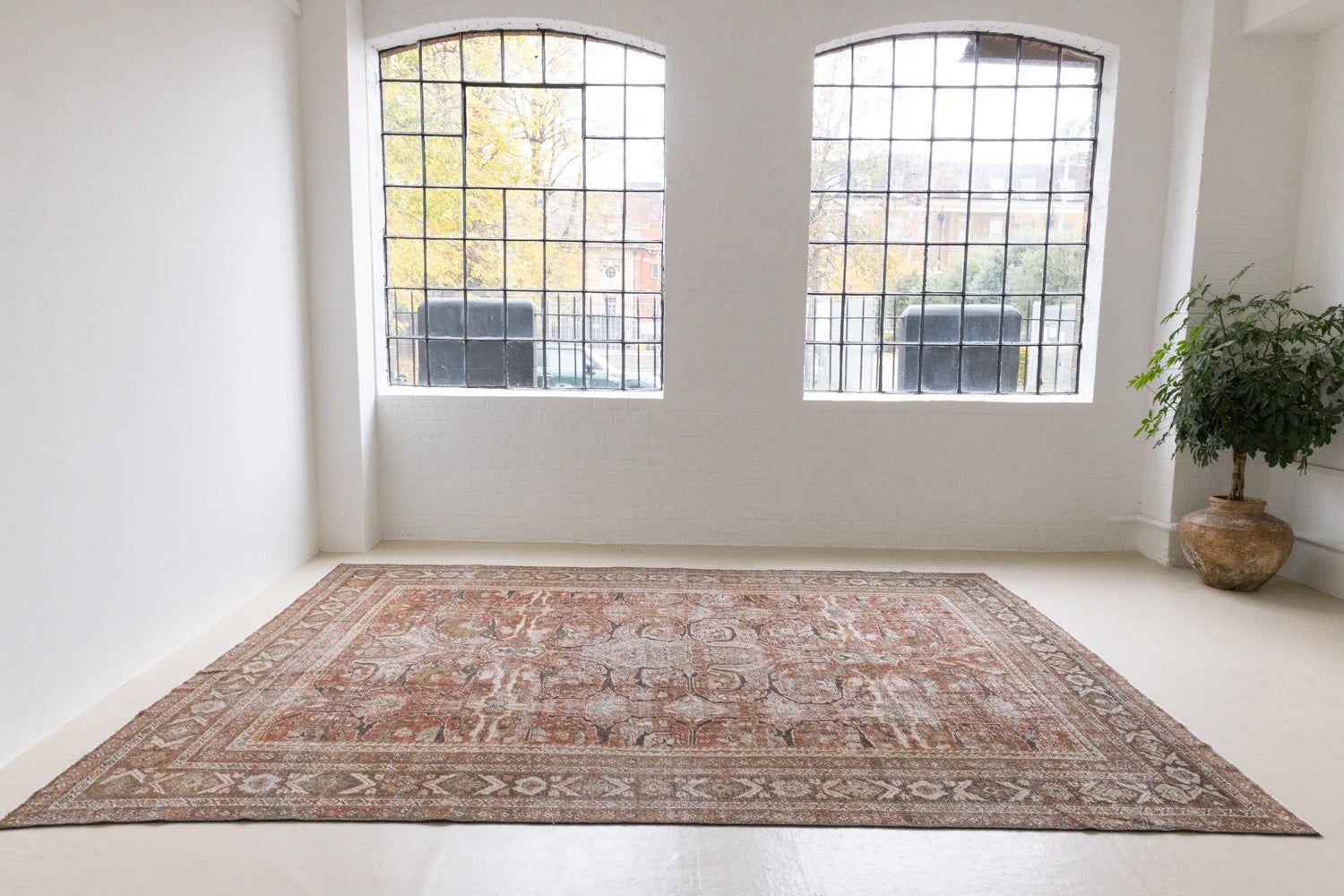 This is a antique Persian Mahal rug. Persia has the most desirable rugs and carpets with stunning designs such as this carpet. Now available at Ourika London.