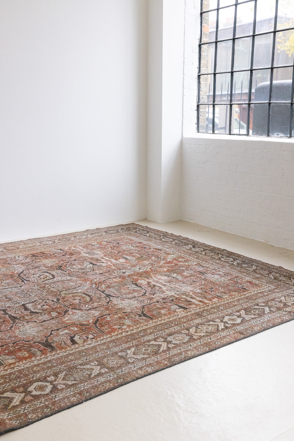 This is a antique Persian Mahal rug. Persia has the most desirable rugs and carpets with stunning designs such as this carpet. Now available at Ourika London.