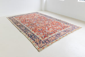 This is a handmade antique Heriz rug woven in Persia. The Heriz region is known for producing some of the most ornate Persian carpet, often known for their mesmerising and intricate repeating patterns.