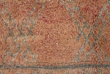 Aliya Beni M’guild vintage thick pile carpet. Peach coloured with a grey geometric pattern.
