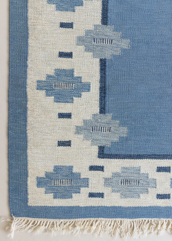 An original mid-century vintage Swedish flatweave rug in blue and ivory