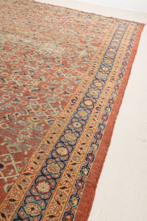 This is a handmade antique Mahal rug woven in Persia. The Mahal region is known for producing some of the most ornate Persian carpet, often known for their mesmerising and intricate repeating patterns.
