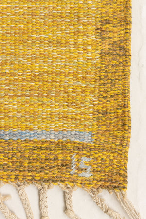 Eliza is a röllakan rug handwoven by textile designer Ingegerd Silow. Featuring a yellow, white and grey pattern