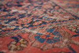 Handmade Teresa Malayer Rug with Captivating Repeating Motifs