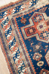 Antique Yuri Rug with Vibrant Geometric Designs - Guard border