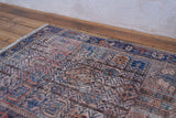 Handmade Flossie: Antique Afghan Rug with Stylised Geometric Motifs