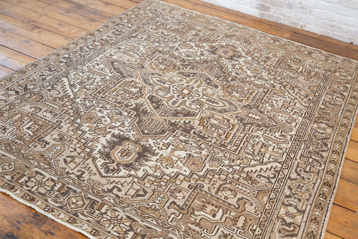 Mirabelle 90-year-old vintage Persian Heriz rug from Ourika London. That has been over-dyed using a unique procedure to gradually fade its original colour. Persia is where you will find the finest carpets and rugs will amzing designs and colours.