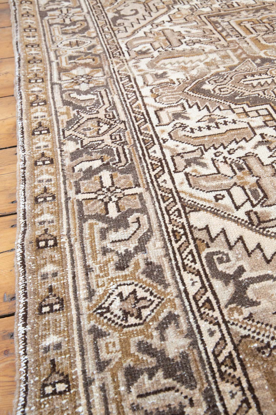 Mirabelle 90-year-old vintage Persian Heriz rug from Ourika London. That has been over-dyed using a unique procedure to gradually fade its original colour. Persia is where you will find the finest carpets and rugs will amzing designs and colours.