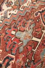 Traditional Sami Heriz Rug with Bold Patterns and Vibrant Colors