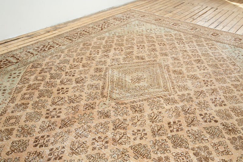Bridget antique rug with faded and soft-colored pattern - Field View
