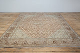 Bridget rug showcasing four-petal flower patterns - Front View
