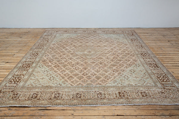 Bridget rug showcasing four-petal flower patterns - Front View