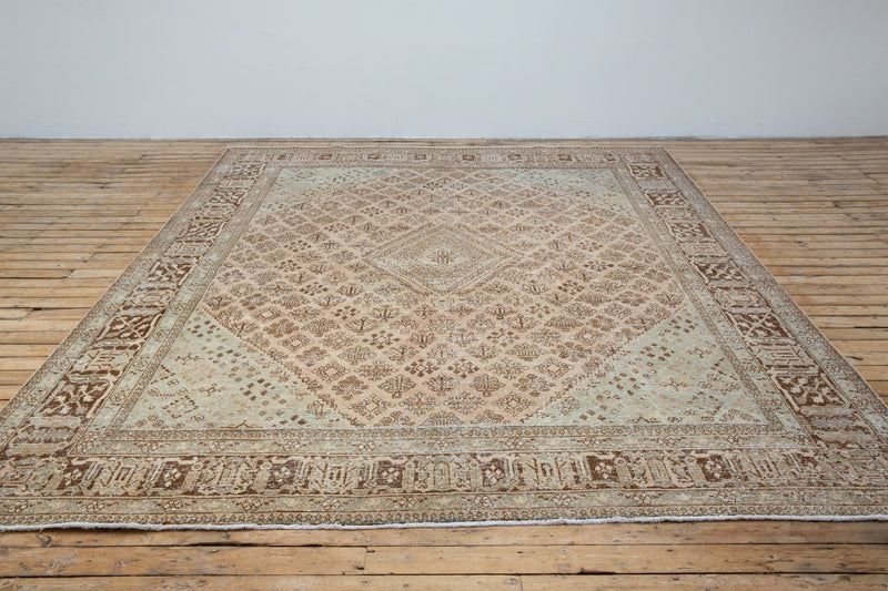 Bridget rug showcasing four-petal flower patterns - Front View